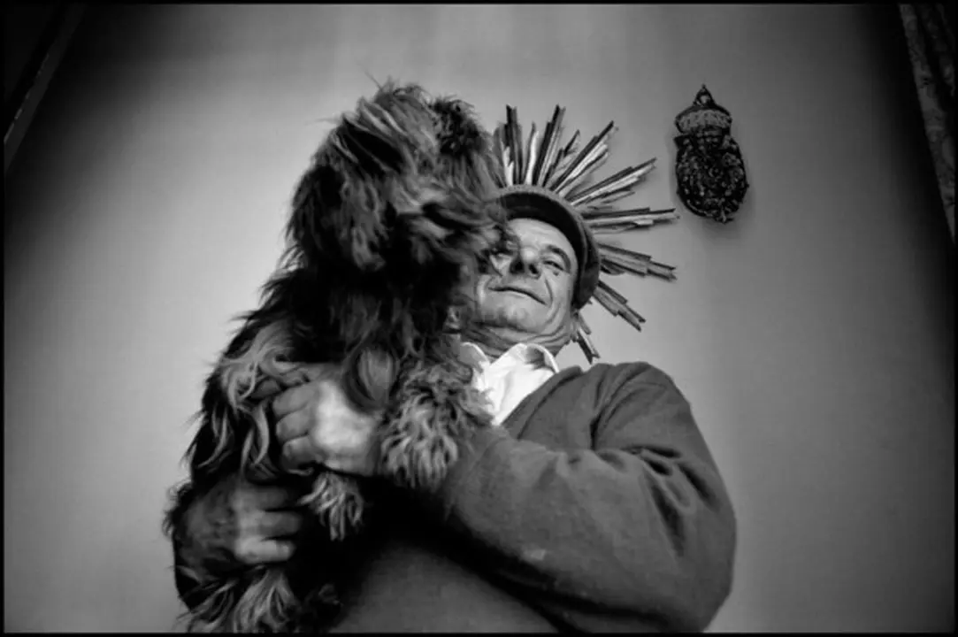 1993. Man with his dog.