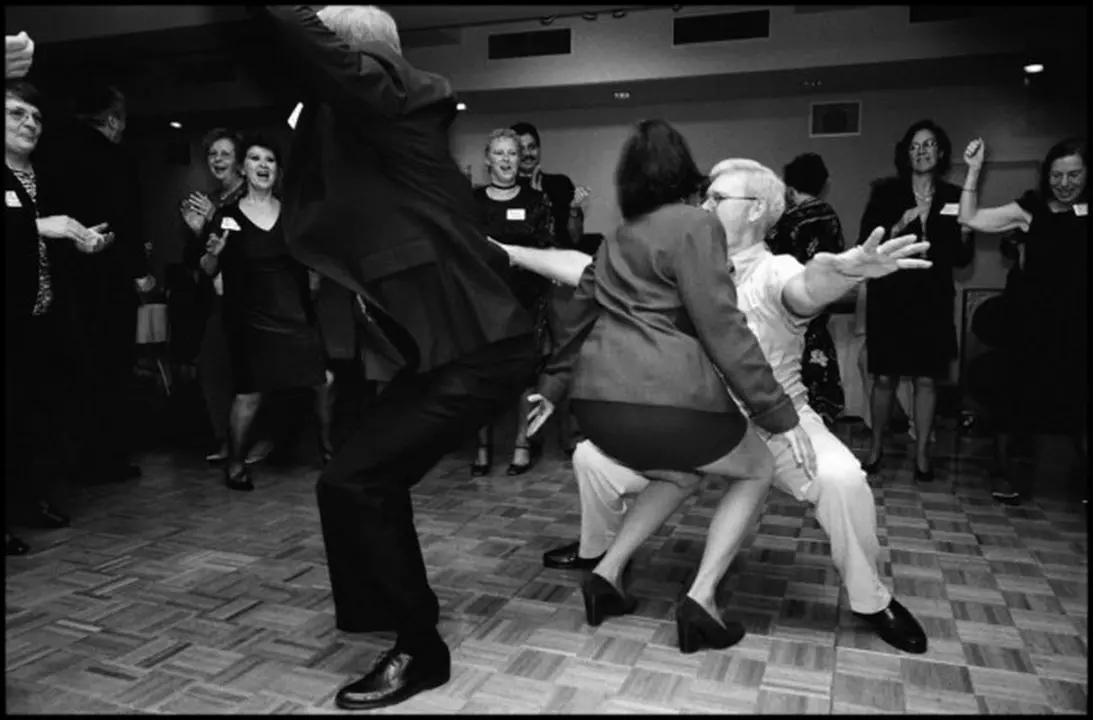 USA. Edison, New Jersey. October 7, 2000. The Perth Amboy High School Class of 1965 Reunion at the Clarion Hotel in Edison. Classmates dance in a pleasant time zone daze as they forget the necessary preparations for the avoidance of the coming sore muscles of the next day.