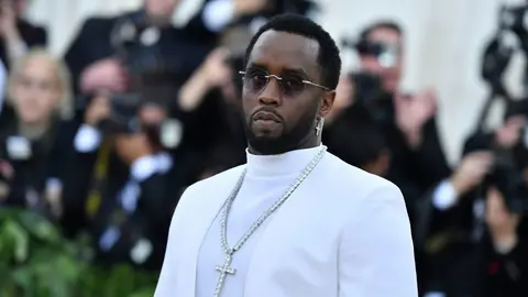 TOPSHOT - Sean Combs arrives for the 2018 Met Gala on May 7, 2018, at the Metropolitan Museum of Art in New York. - The Gala raises money for the Metropolitan Museum of Arts Costume Institute. The Gala's 2018 theme is Heavenly Bodies: Fashion and the Catholic Imagination. (Photo by Angela WEISS / AFP)        (Photo credit should read ANGELA WEISS/AFP/Getty Images)