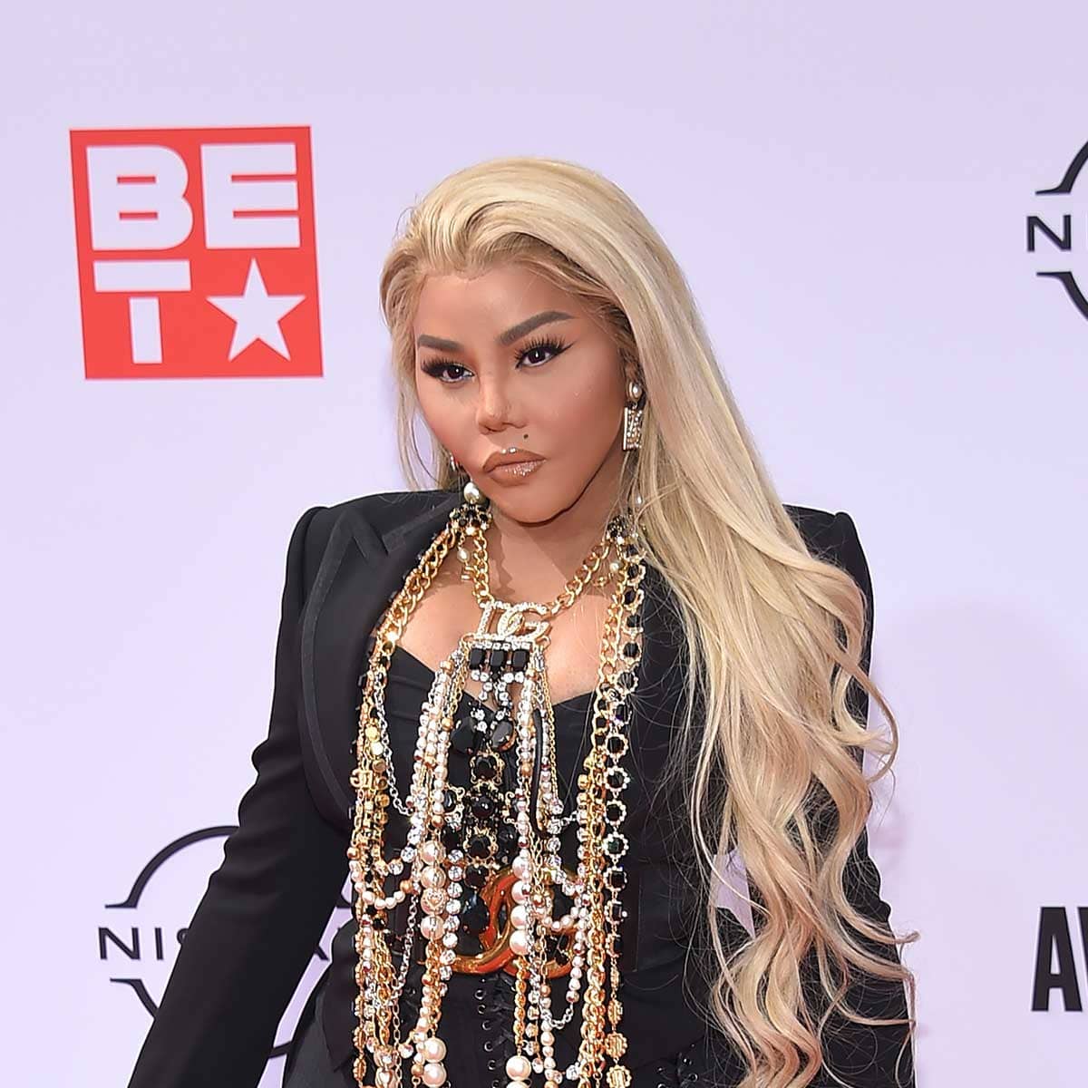 Lil Kim: altura 1,50 m